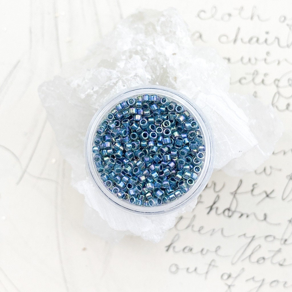 Blue Topaz Lined Crystal Rainbow Aiko Seed Beads