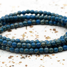 Load image into Gallery viewer, 4mm Blue with Picasso Round Druk Bead Strand
