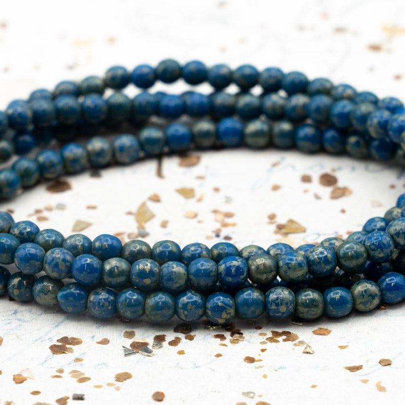 4mm Blue with Picasso Round Druk Bead Strand