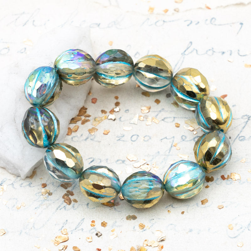 10mm Transparent Glass with Gold Luster and a Turquoise Finish Faceted Melon Bead Strand