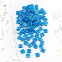 Load image into Gallery viewer, Transparent Capri Blue AB Tila Beads
