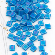 Load image into Gallery viewer, Transparent Capri Blue AB Tila Beads
