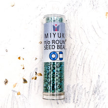 Load image into Gallery viewer, 11/0 Round Matte Foam Green Picasso Seed Bead Tube
