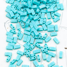 Load image into Gallery viewer, Matte Opaque Turquoise AB Half Tila Beads
