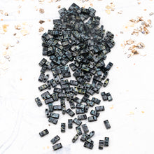 Load image into Gallery viewer, Smoky Black Matte Half Tila Beads
