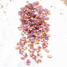 Load image into Gallery viewer, Transparent Dark Topaz AB Half Tila Beads
