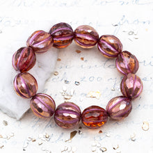 Load image into Gallery viewer, 10mm Transparent Peach with a Copper Rainbow Finish and a Metallic Pink Wash Faceted Melon Bead Strand
