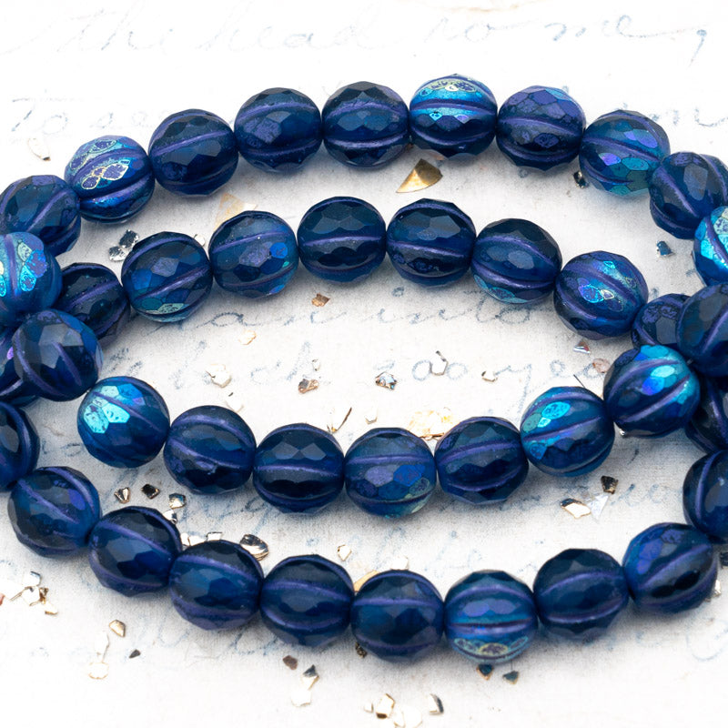 8mm Matte Sapphire with AB Finish and Purple Wash Faceted Melon Bead Strand