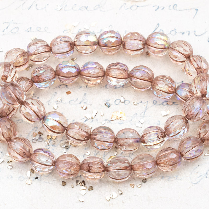 8mm Transparent Glass with AB and Metallic Beige Finishes Faceted Melon Bead Strand
