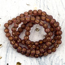 Load image into Gallery viewer, 3mm Melon Dark Dusty Rose with a Gold Wash Bead Strand
