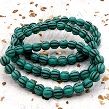 Load image into Gallery viewer, 5mm Melon Matte Sea Green with Brown Wash Bead Strand
