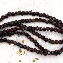 Load image into Gallery viewer, 3mm Melon Black with a Picasso Finish Bead Strand
