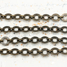 Load image into Gallery viewer, 10mm Antique Brass Washer Link Chain - 1 Foot
