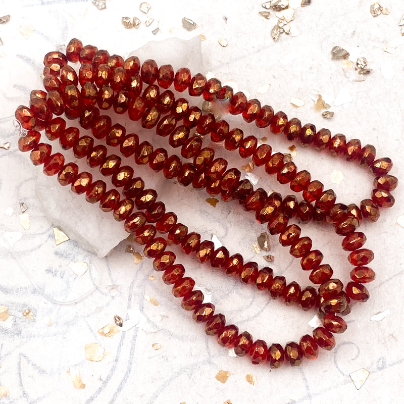3x2mm Ruby Red with Gold Luster Rondelle Strand