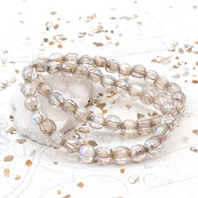 Load image into Gallery viewer, 6mm Transparent with Beige Wash and AB Finish Faceted Melon Bead Strand
