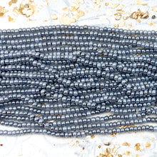 Load image into Gallery viewer, 10/0 Grey Galway Girl Seed Bead Hank
