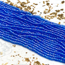Load image into Gallery viewer, 10/0 Sparkling Blue Seed Bead Hank
