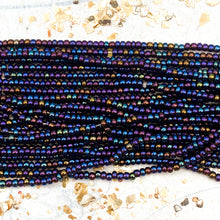 Load image into Gallery viewer, 10/0 Metallic Dark Iris Rainbow Seed Bead Hank
