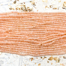 Load image into Gallery viewer, 10/0 Pretty Peaches Seed Bead Hank
