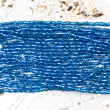 Load image into Gallery viewer, 10/0 Metallic Aqua Seed Bead Hank
