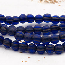 Load image into Gallery viewer, 6mm Sapphire with Mate Finish and Brown Wash Large Hole Melon Bead Strand
