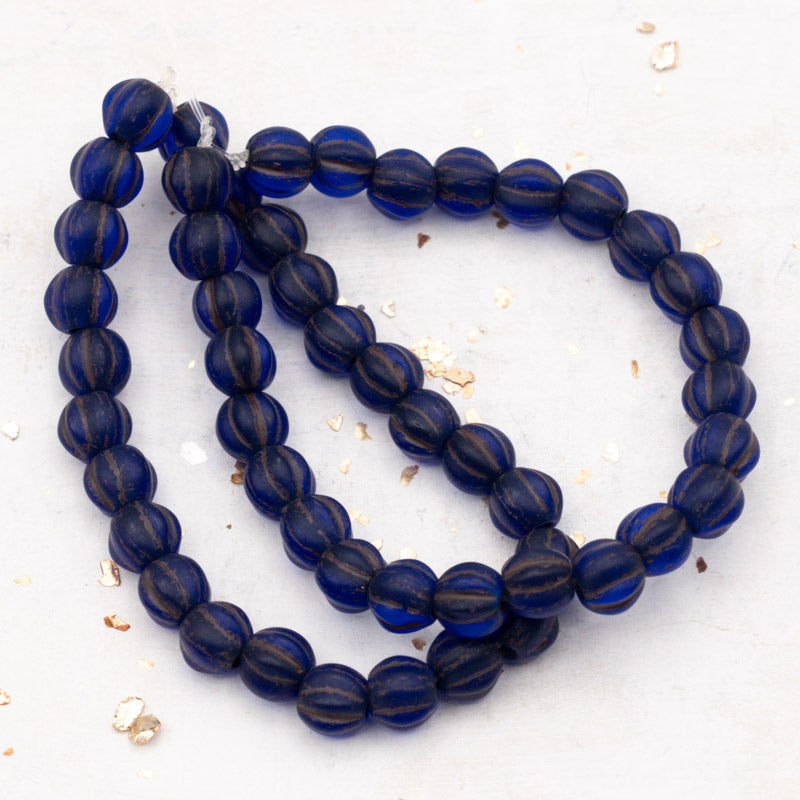 6mm Sapphire with Mate Finish and Brown Wash Large Hole Melon Bead Strand