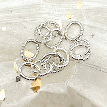 Load image into Gallery viewer, Sterling Silver Plated 6mm Textured Oval Jump Rings-12 pcs
