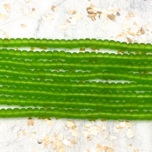 Load image into Gallery viewer, 6/0 Green Girl Seed Bead Hank
