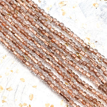 Load image into Gallery viewer, 6/0 Clearly Bronze Seed Bead Hank
