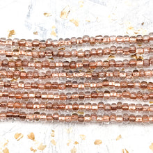 Load image into Gallery viewer, 6/0 Clearly Bronze Seed Bead Hank
