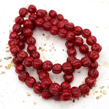 Load image into Gallery viewer, 6mm Ruby Red with Bronze Wash Large Hole Melon Bead Strand
