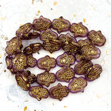 Load image into Gallery viewer, 15x10mm Thistle with Gold Wash Hamsa Hand Bead Strand
