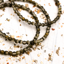 Load image into Gallery viewer, 3mm Gray with Etched and Gold Finishes Round Druk Bead Strand
