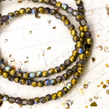 Load image into Gallery viewer, 3mm Gray with AB, Etched, and Gold Finishes Round Druk Bead Strand
