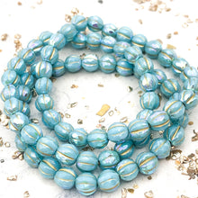 Load image into Gallery viewer, 6mm Sky Blue with Rainbow AB Finish and Gold Wash Faceted Melon Bead Strand
