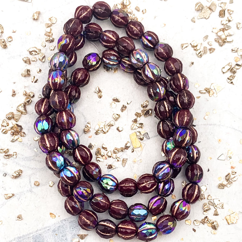 6mm Deep Maroon with Rainbow AB Finish and Copper Wash Faceted Melon Bead Strand