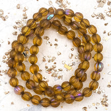 Load image into Gallery viewer, 6mm Matte Amber with AB Finish and Bronze Wash Faceted Melon Bead Strand
