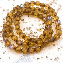 Load image into Gallery viewer, 6mm Matte Amber with AB Finish and Bronze Wash Faceted Melon Bead Strand
