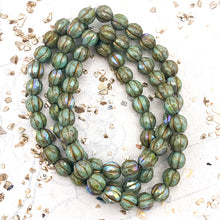 Load image into Gallery viewer, 6mm Tea Green with Picasso and AB Finishes and Gold Wash Faceted Melon Bead Strand
