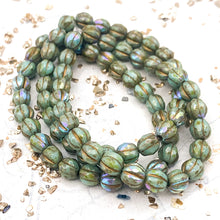 Load image into Gallery viewer, 6mm Tea Green with Picasso and AB Finishes and Gold Wash Faceted Melon Bead Strand
