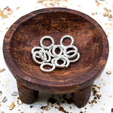 Load image into Gallery viewer, Sterling Silver Plated 6mm Textured Jump Rings - 12pcs
