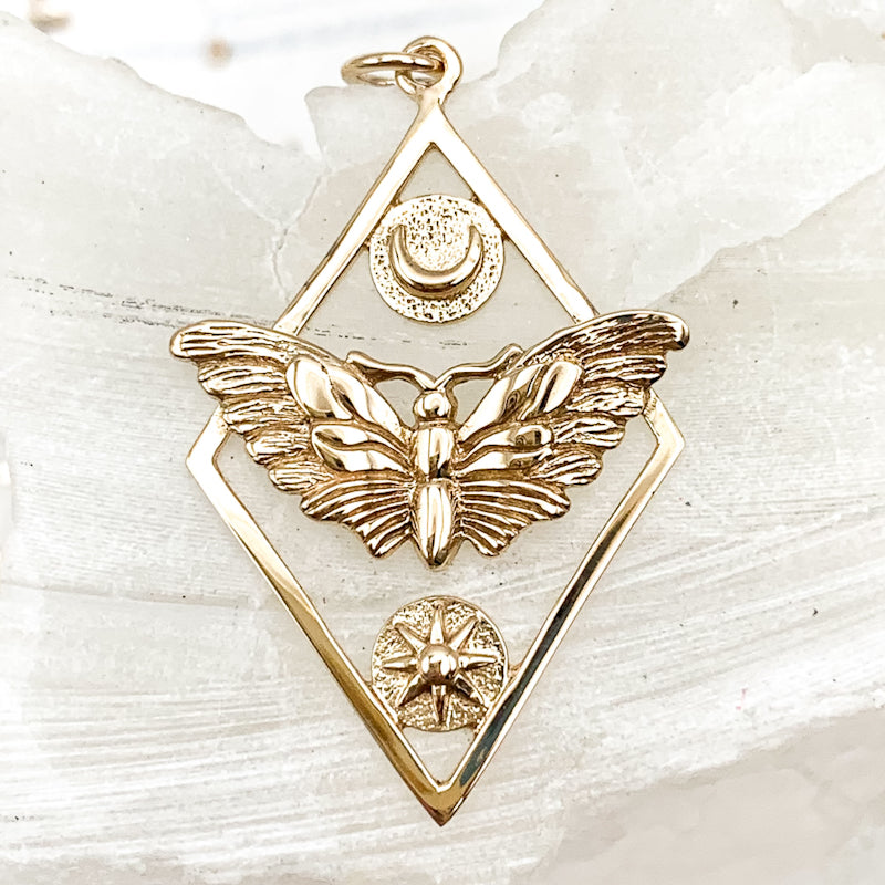 Bronze Geometric Moth Charm with Sun and Moon