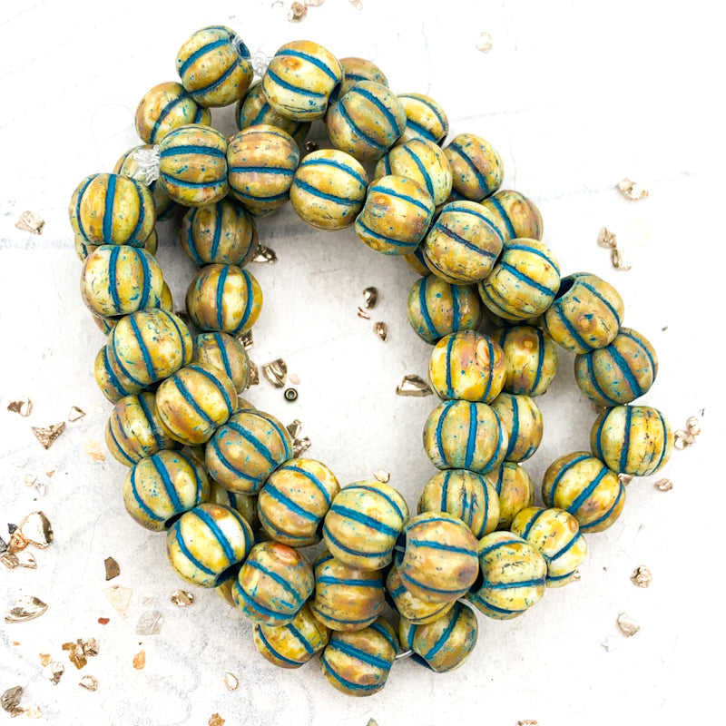 8mm Honey with Picasso Finish and Turquoise Wash Large Hole Melon Bead Strand