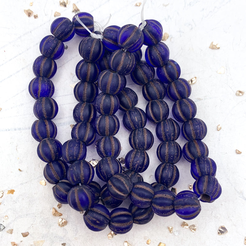 8mm Sapphire with Matte Finish and Brown Wash Large Hole Melon Bead Strand