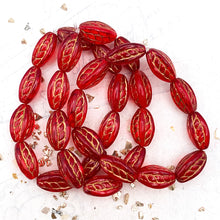 Load image into Gallery viewer, 15x9mm Ruby Red with Gold Wash Twisted Oval Bead Strand
