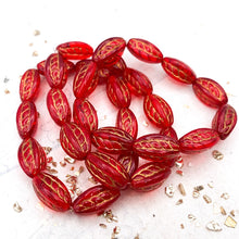 Load image into Gallery viewer, 15x9mm Ruby Red with Gold Wash Twisted Oval Bead Strand
