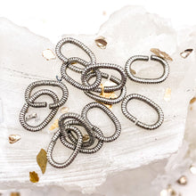 Load image into Gallery viewer, Antique Silver 9mm Textured Oval Jump Rings - 12pcs

