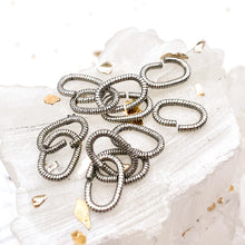 Load image into Gallery viewer, Antique Silver 9mm Textured Oval Jump Rings - 12pcs
