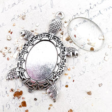 Load image into Gallery viewer, 25mm Antique Silver Turtle Bezel Charm with Clear Acrylic Cabochon
