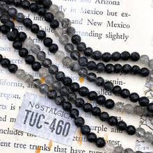 Load image into Gallery viewer, Round Faceted Onyx Ombre Strand
